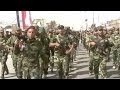 Iraqi Shias show force in weapons parade
