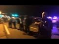Officer to protestors: I will kill you