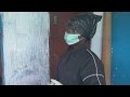 Nursing student uses trash bags as protection from ebola.