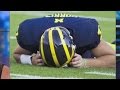 Michigan quarterback plays despite concussion
