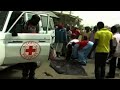 'Prying out charred bodies from burned out vehicles...