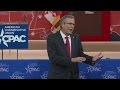 Conservatives cheer and boo Jeb Bush