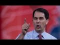 Walker highlights contrast with Bush