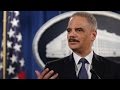 Holder: Ferguson police shooter a 'punk'