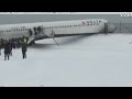 Plane skids off runway at LGA