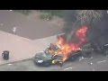 Baltimore police car up in flames