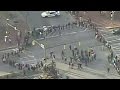 Protesters block major Baltimore intersection