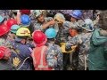 Survivors pulled out of rubble in Nepal